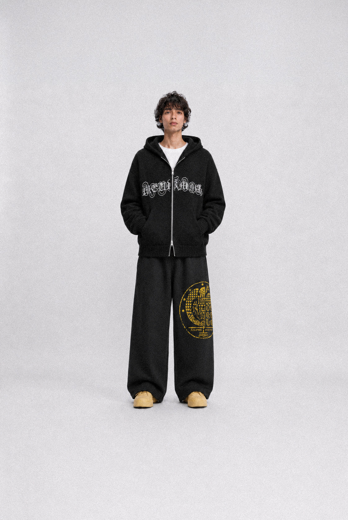 black "SCRIPT" knit jacket