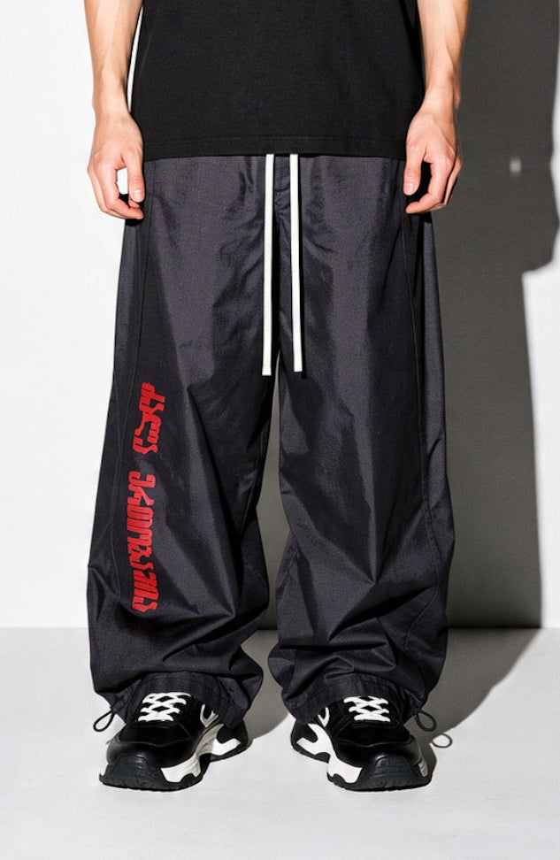 "UNITY" nylon trackpants