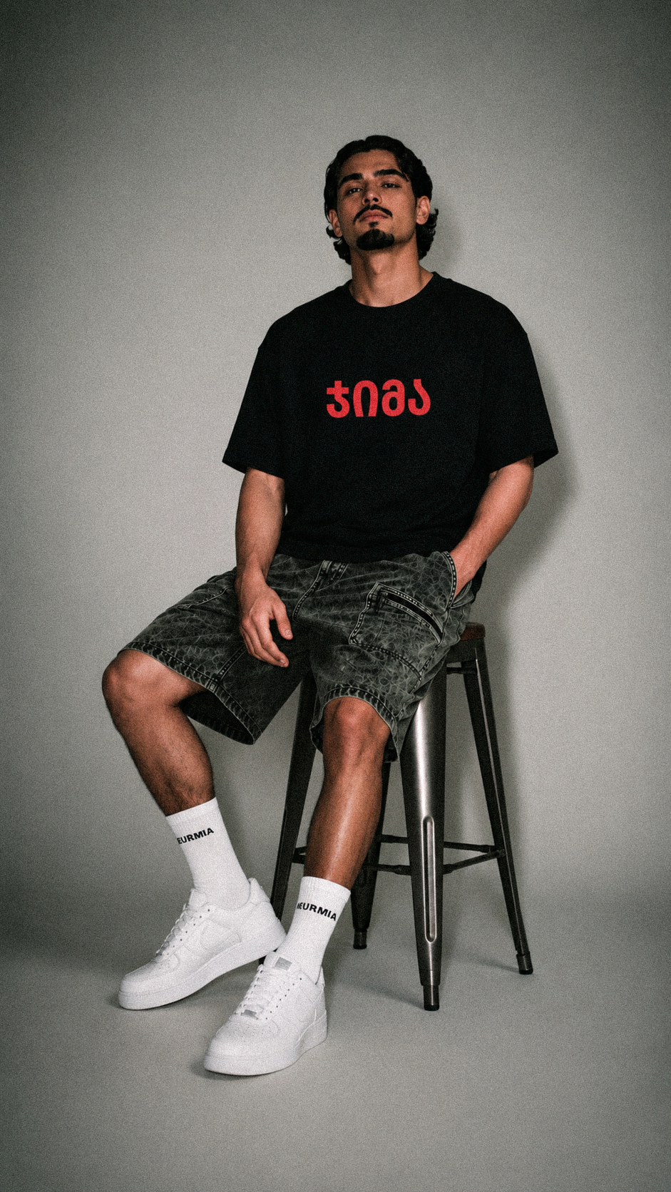 black "JIMA" t-shirt