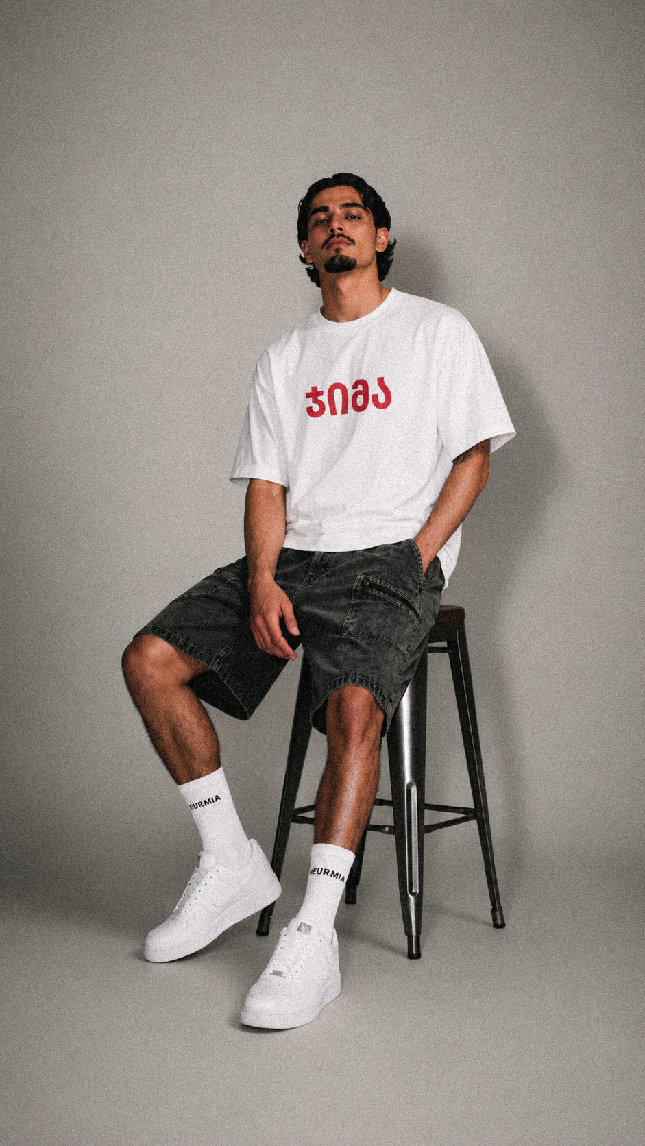 white "JIMA" t-shirt