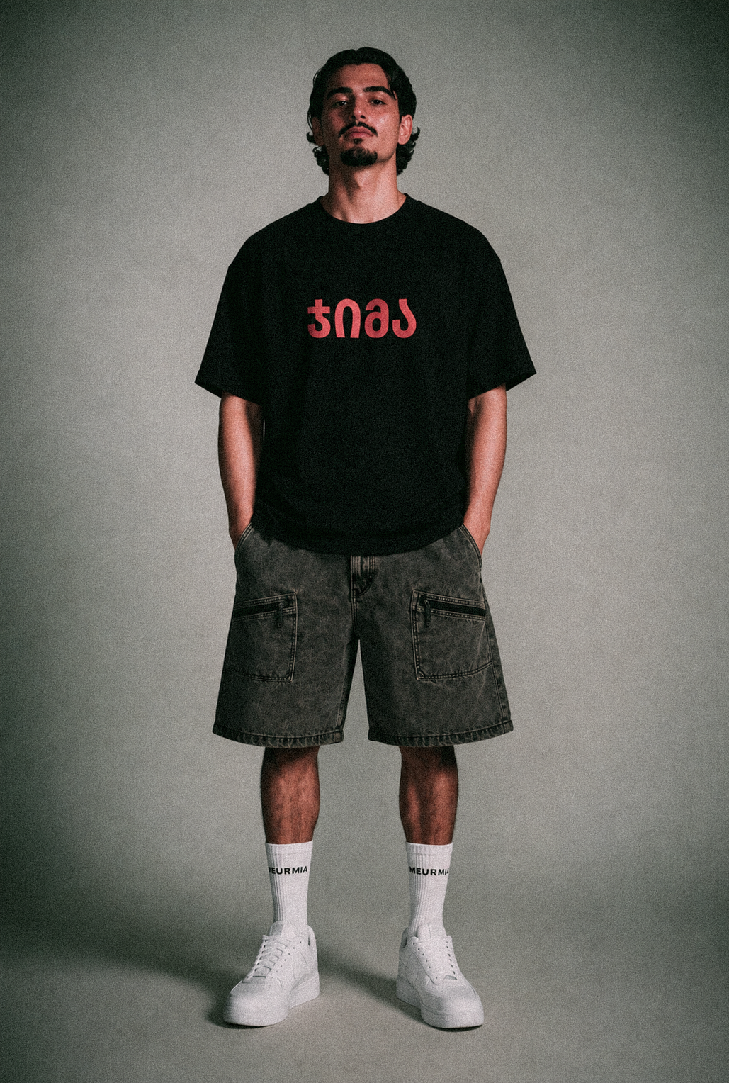 black "JIMA" t-shirt